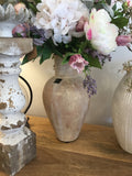 Tall concrete vase