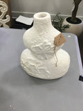 White flower bust vase