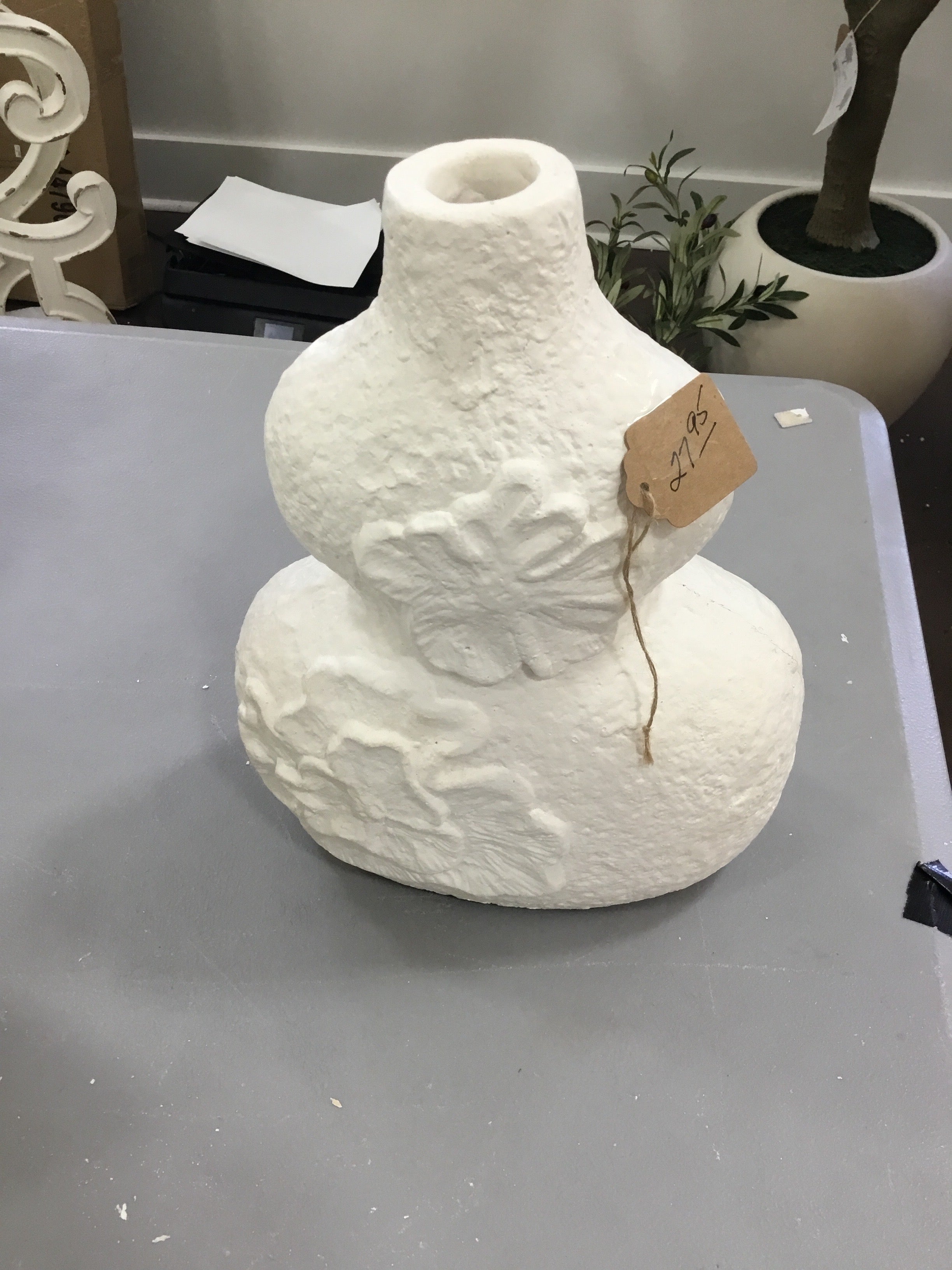 White flower bust vase