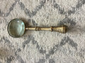 Small brass magnifying