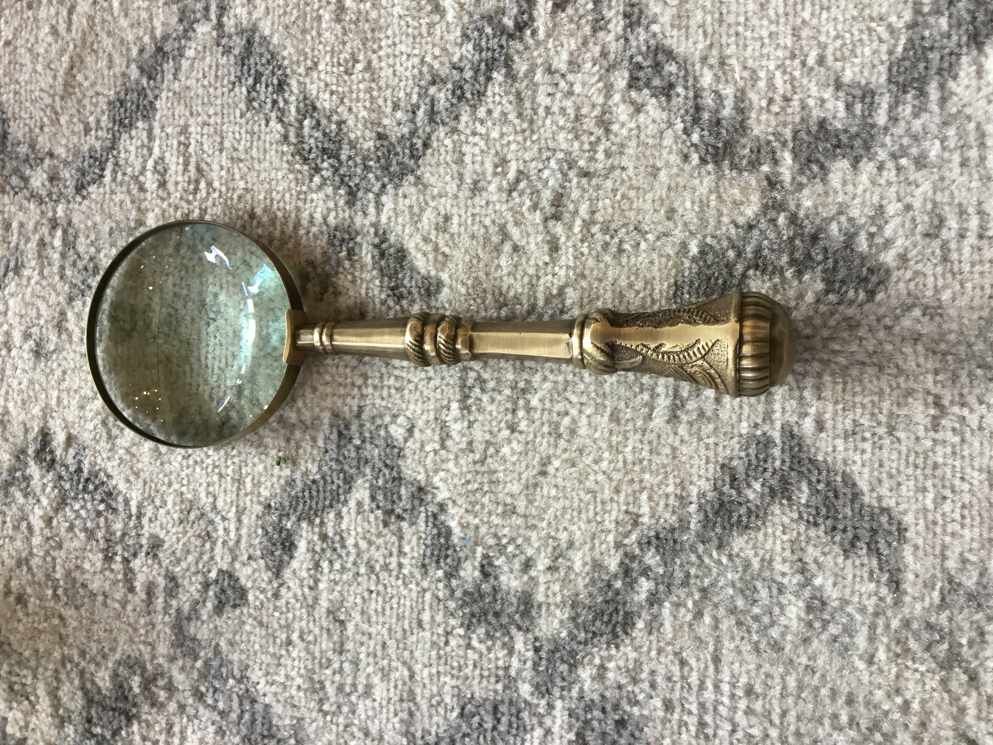 Small brass magnifying