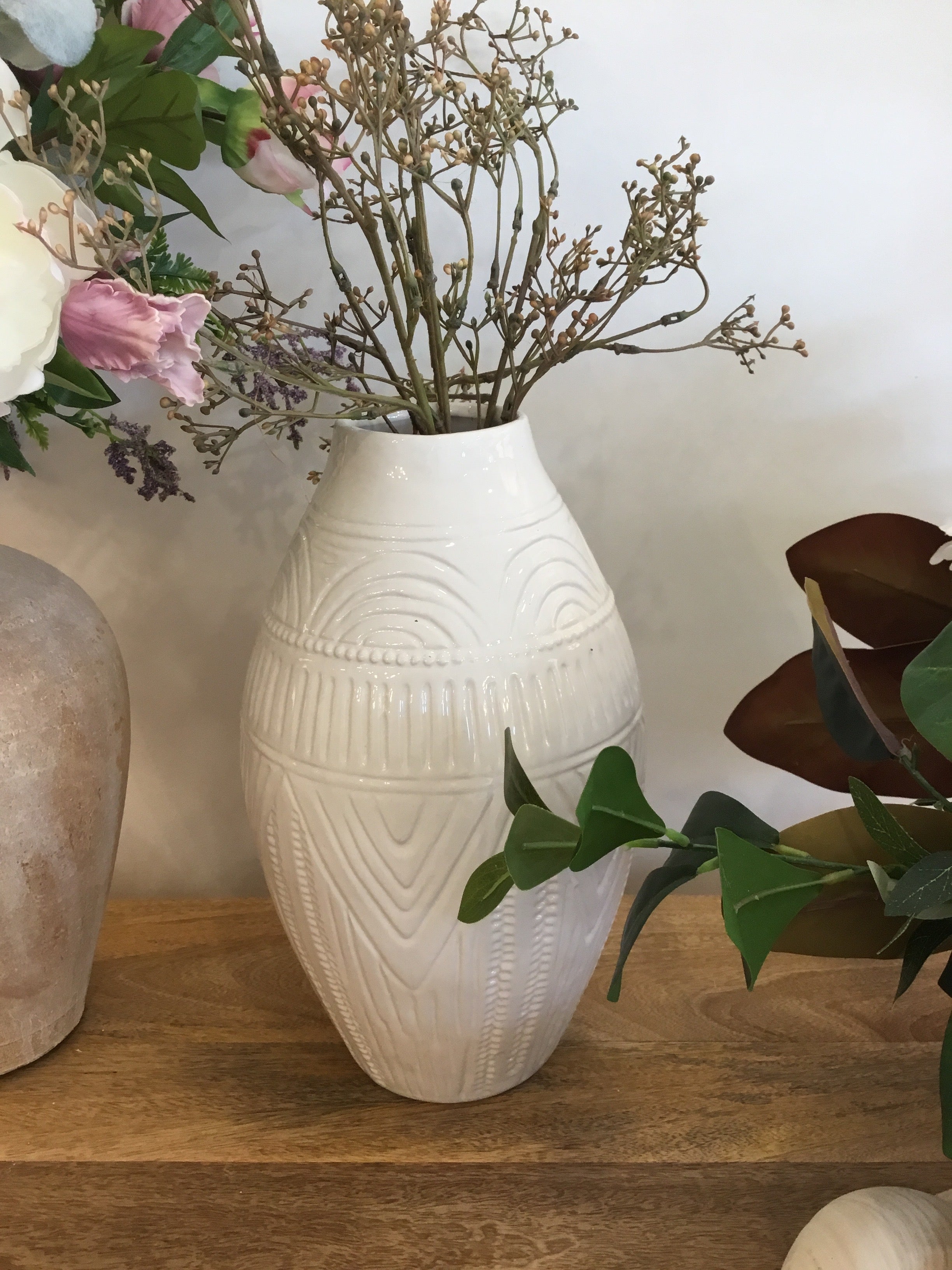 White vase with markings