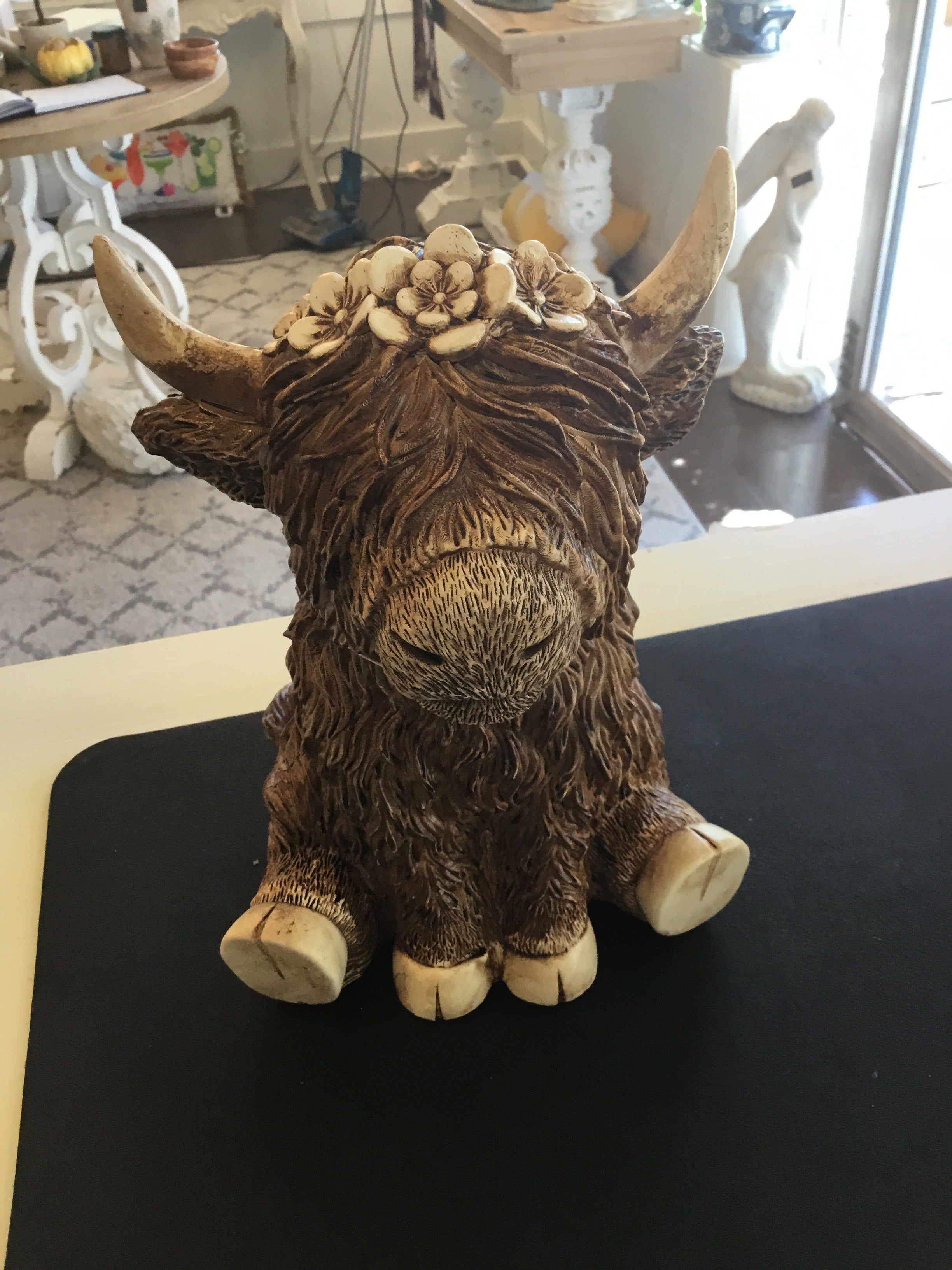 Highland cow with flower crown