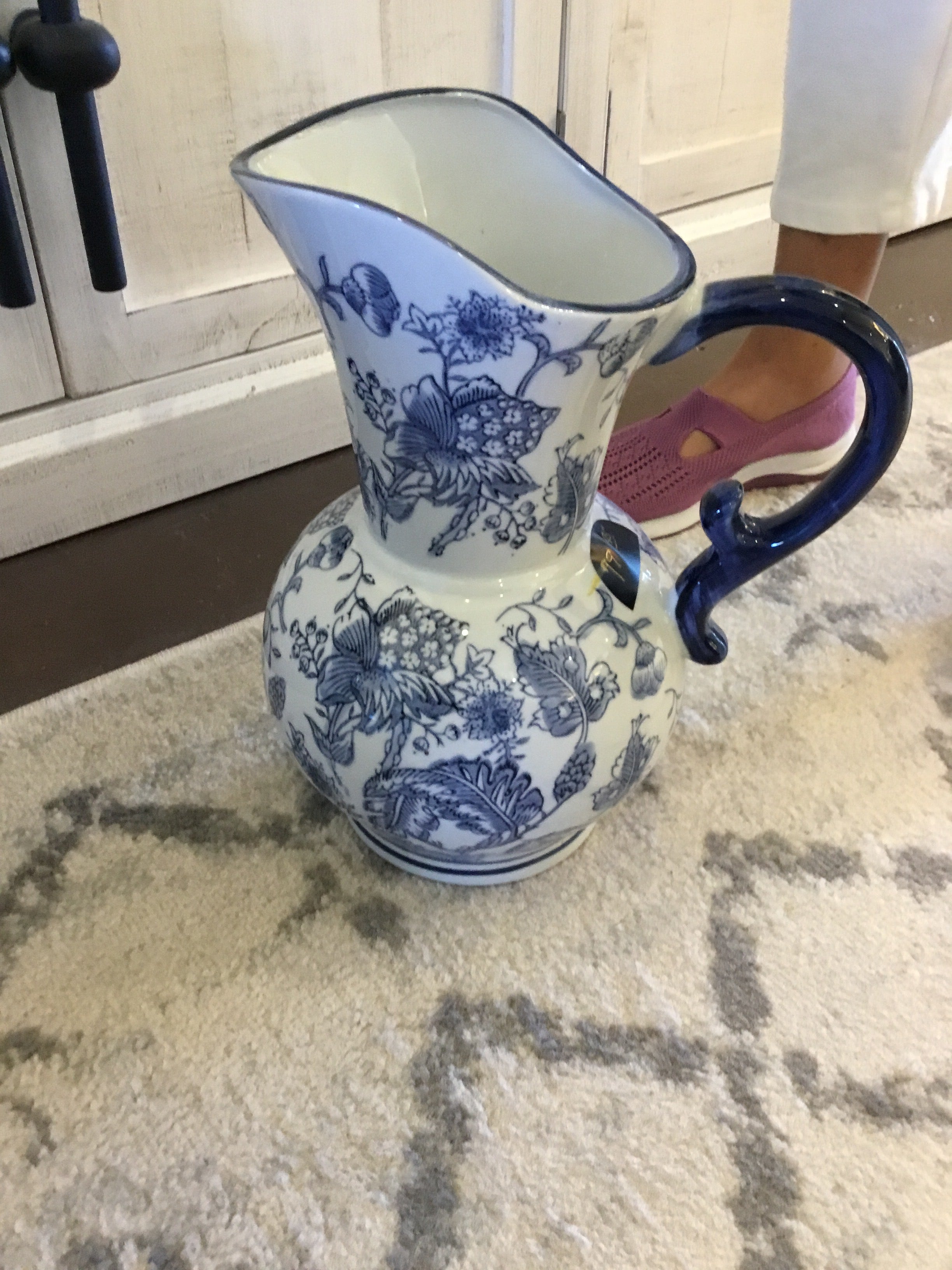 Large antique blue and white pitcher