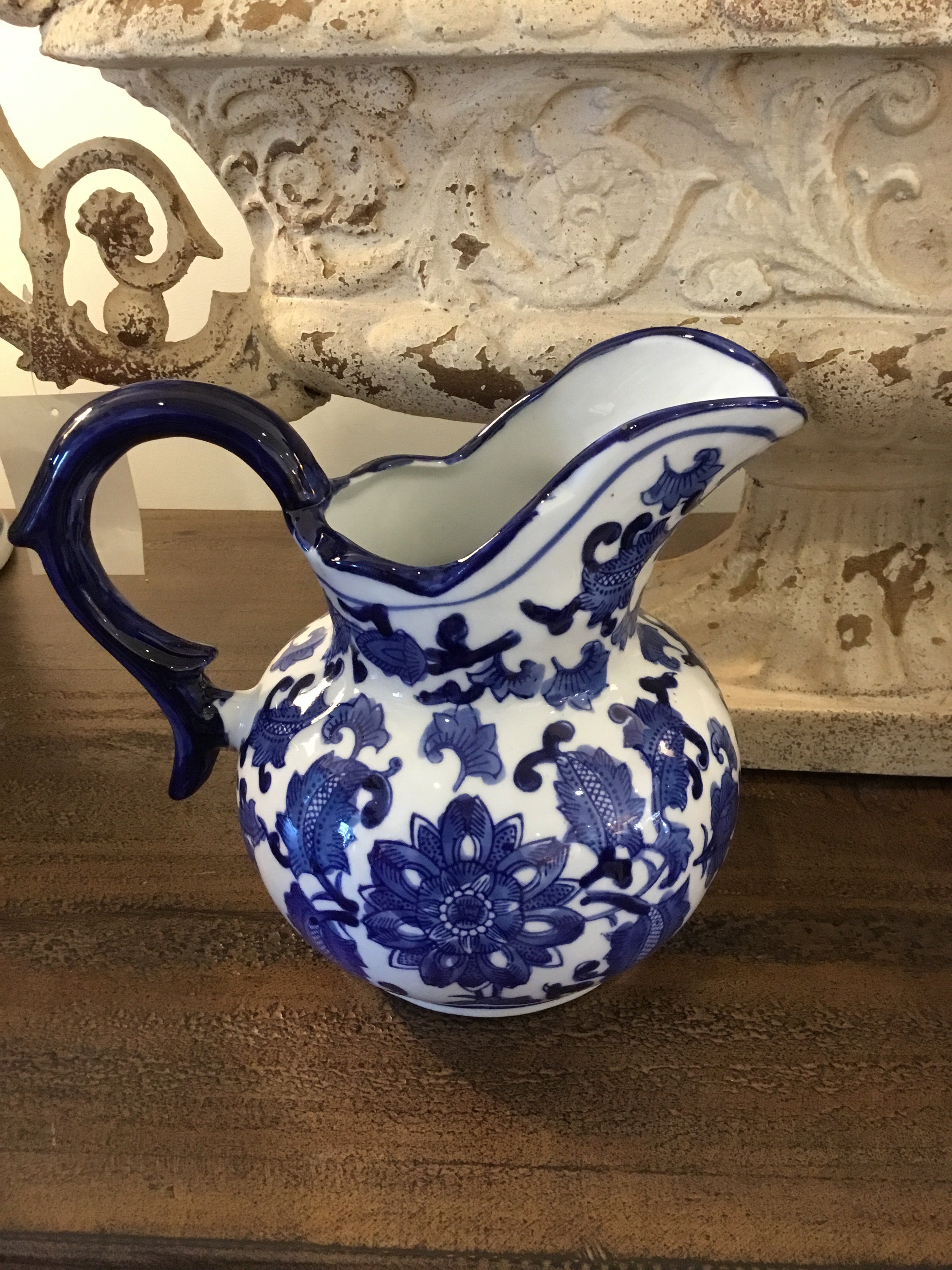 Small antique blue and white pitcher