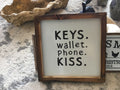 Keys wallet phone kiss sign