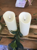 Tall flickering candles