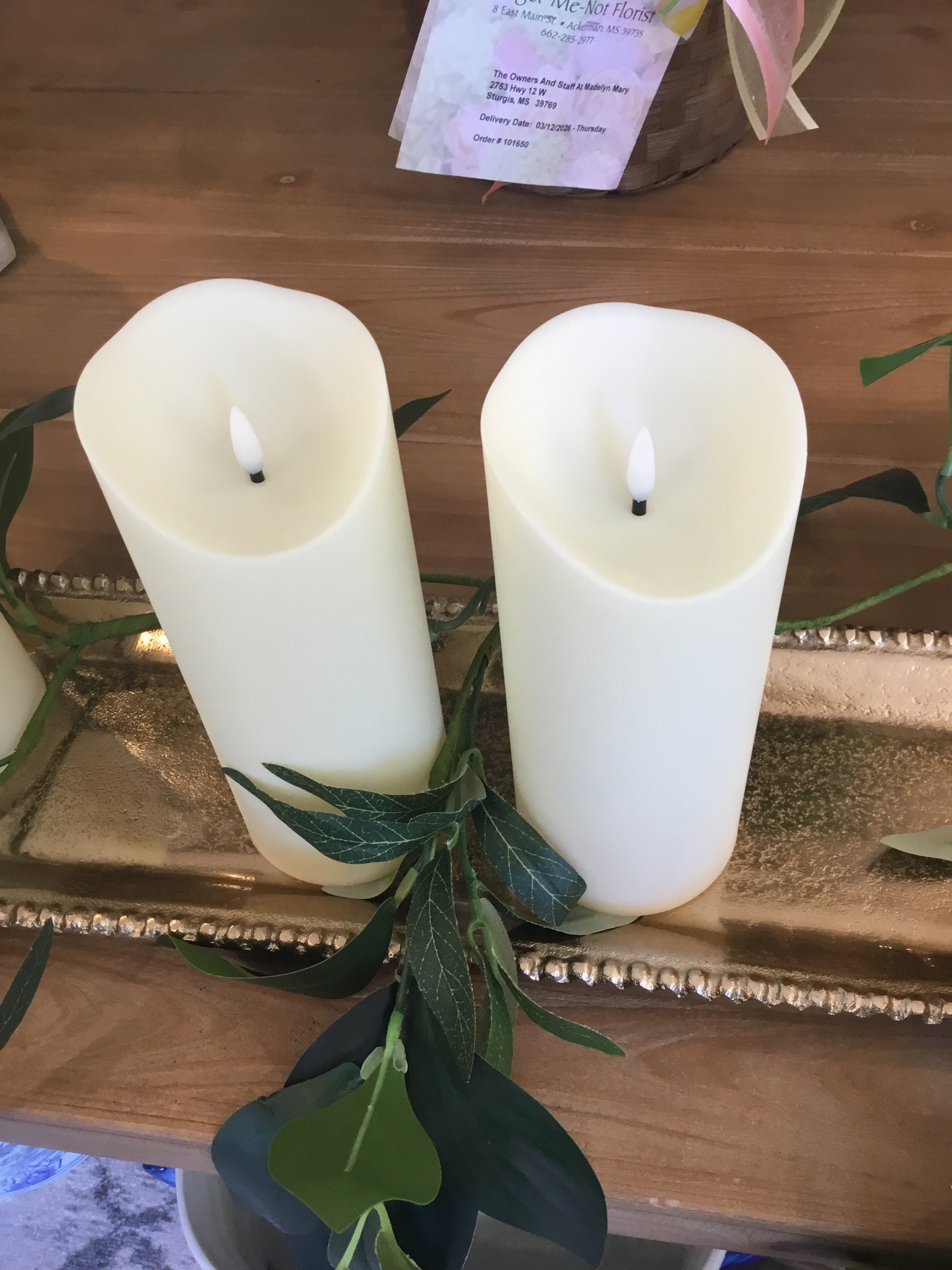 Tall flickering candles